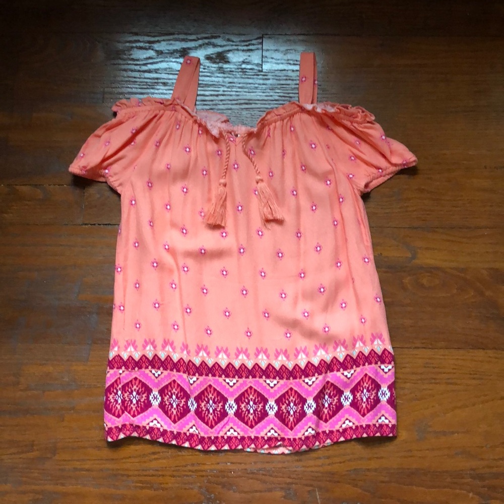 a off the shoulder shirt with straps. worn once